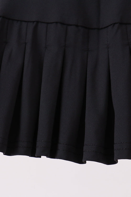 Black pleated skort