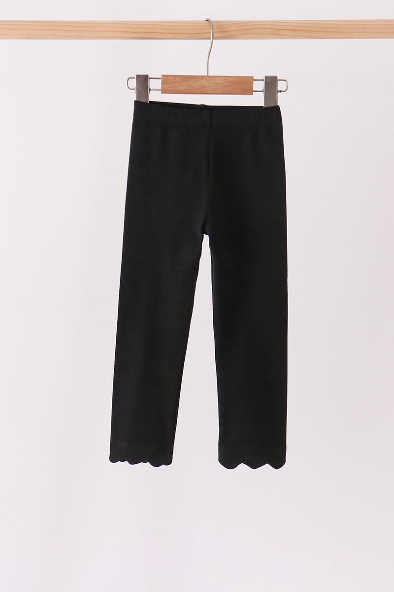 Black scalloped leggings