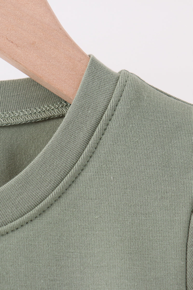 Green pumpkin french knot top